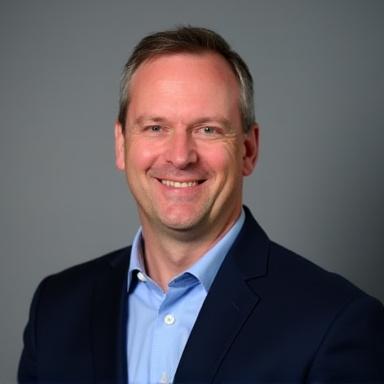 Professional headshot of Dr. Alistair Finch.